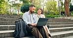 Couple, laptop and reading at park, travel or stairs with search for direction, holiday and planning. Man, woman and happy with pc, bags and typing to check notification for hotel booking in Japan