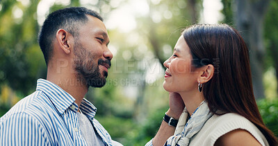 Buy stock photo Japan, outdoor and couple with love, romance and bonding together with relationship. Joyful, man and woman in park, trust and marriage with nature, travel and commitment with weekend break and trip