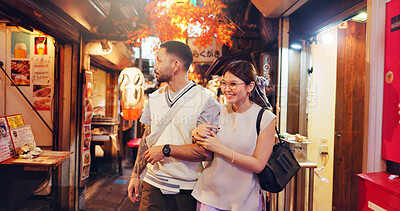 Buy stock photo Couple, city and walking at night market in Japan, love and bonding on honeymoon vacation. People, security and outdoor support on holiday in town, travel together and explore culture or sightseeing