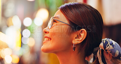 Buy stock photo Asian woman, face and night with smile in city for travel, sightseeing or tourism on bokeh. Japan, tourist or profile of happy female person with joy for holiday destination or vacation trip in Tokyo