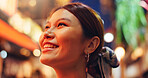 Happy, night and Asian woman in city thinking with lights to explore Japan on holiday, festive event and adventure. Travel, weekend and person at street market for culture, tourism and sightseeing