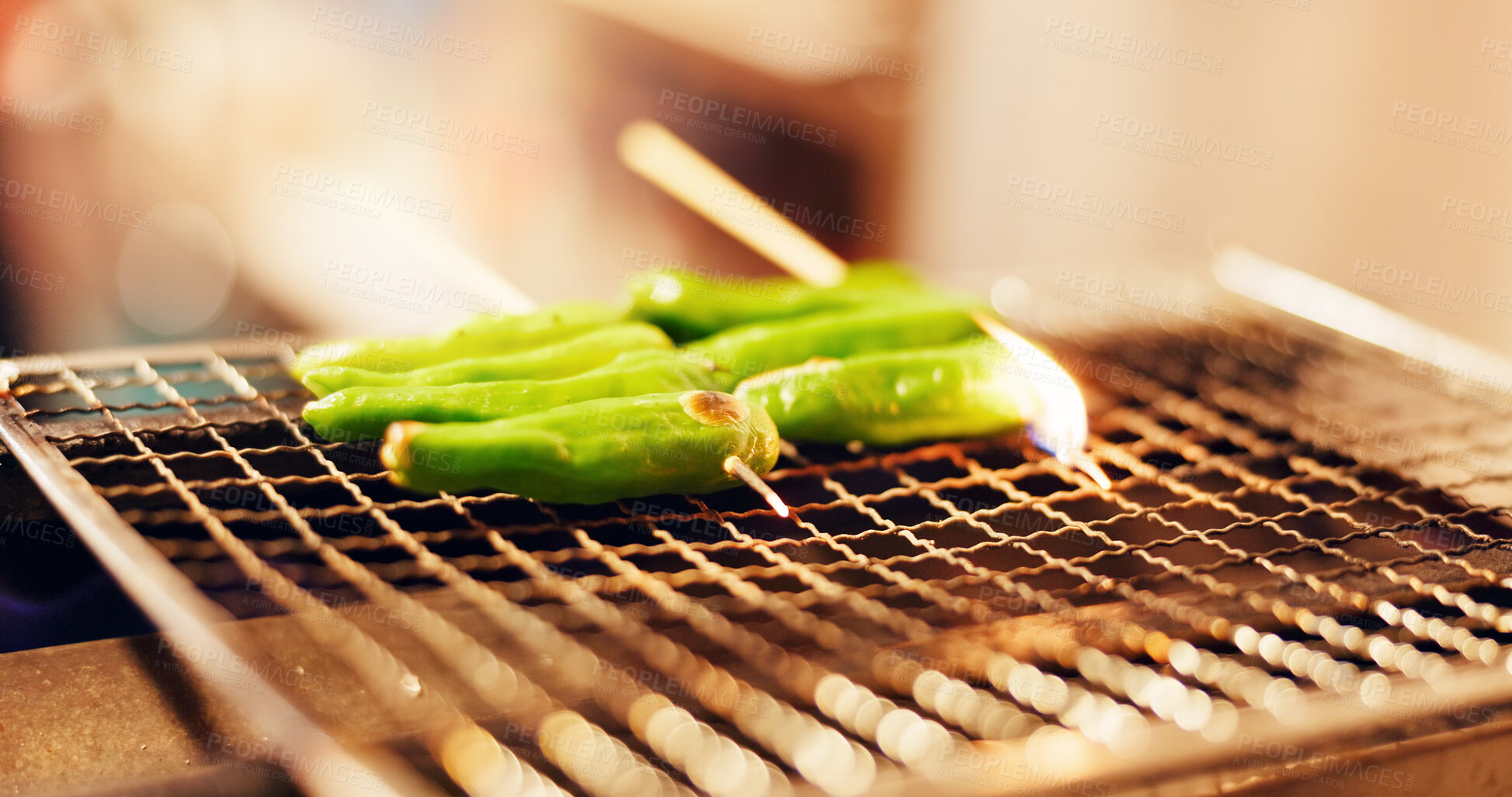 Buy stock photo Japanese, food and green vegetable skewer on grill, outdoor barbecue or traditional kebab dinner on fire. Asian cuisine, culture and cooking pepper kushiyaki cooking on flames at local street market.