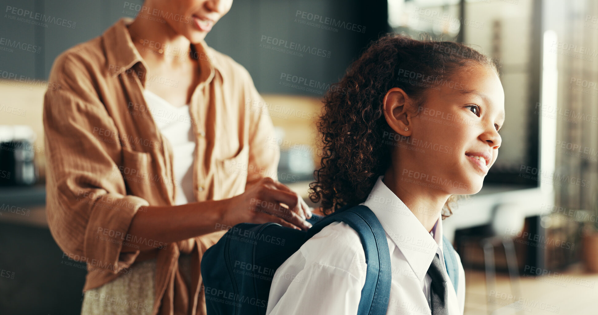 Buy stock photo Mom, girl and happy with backpack in home for preparing or ready for elementary education. Apartment, people and parent with kid in uniform for first day at school with smile, pride and child growth