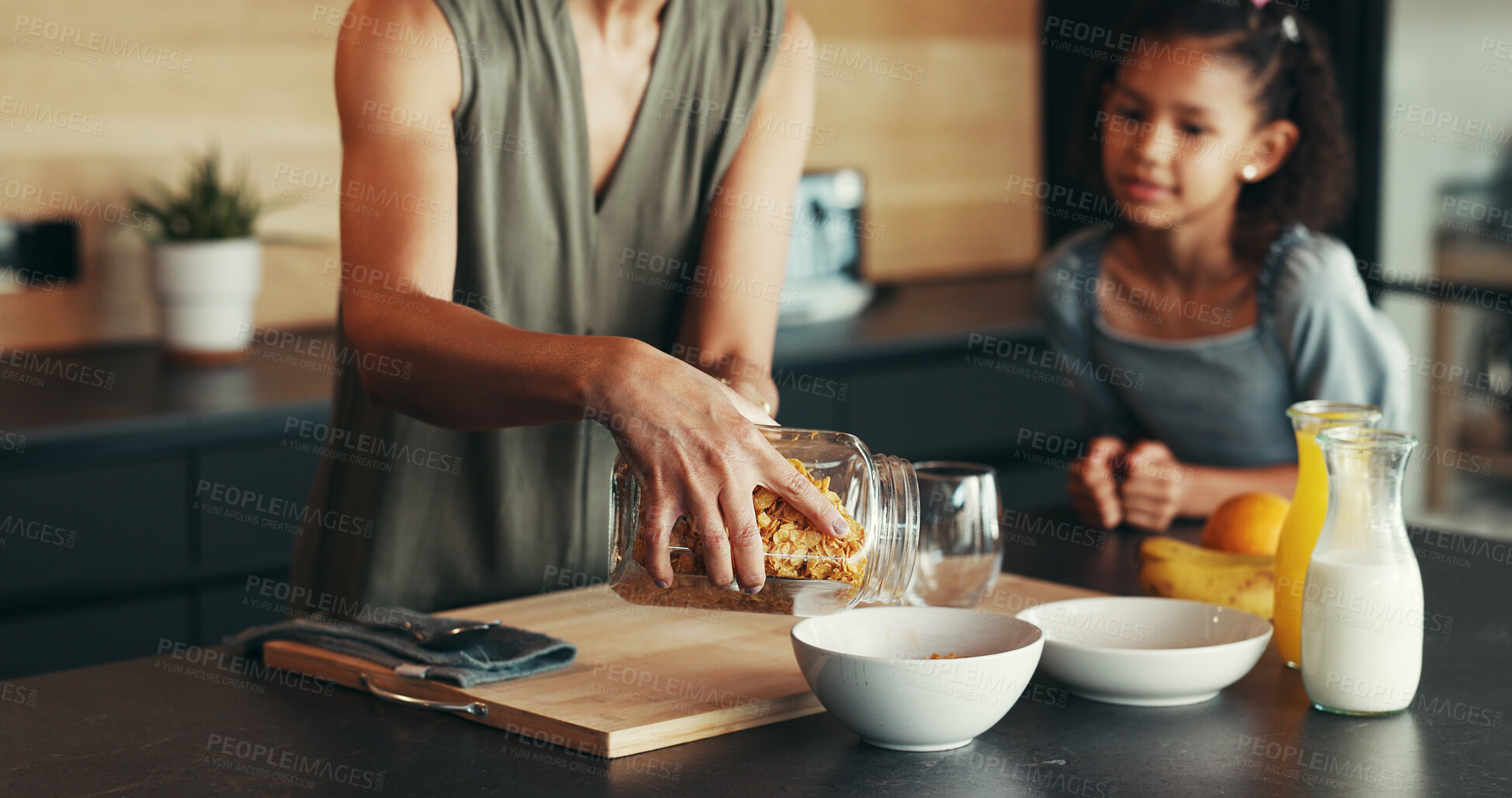 Buy stock photo Hands, child and mother with breakfast cereal, hungry and cooking for health in home. Mom, kid and prepare food in kitchen, help and parent pouring organic morning meal for nutrition, diet and growth