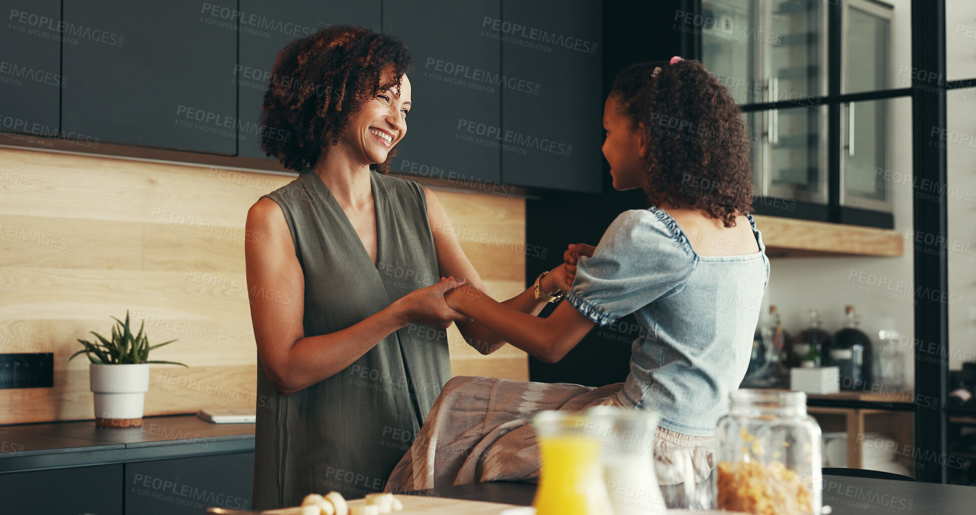 Buy stock photo Kitchen, happy kid and mom holding hands with girl for love, connection or bonding together in morning. Child, mother and daughter with smile in house or family home for affection, care or support