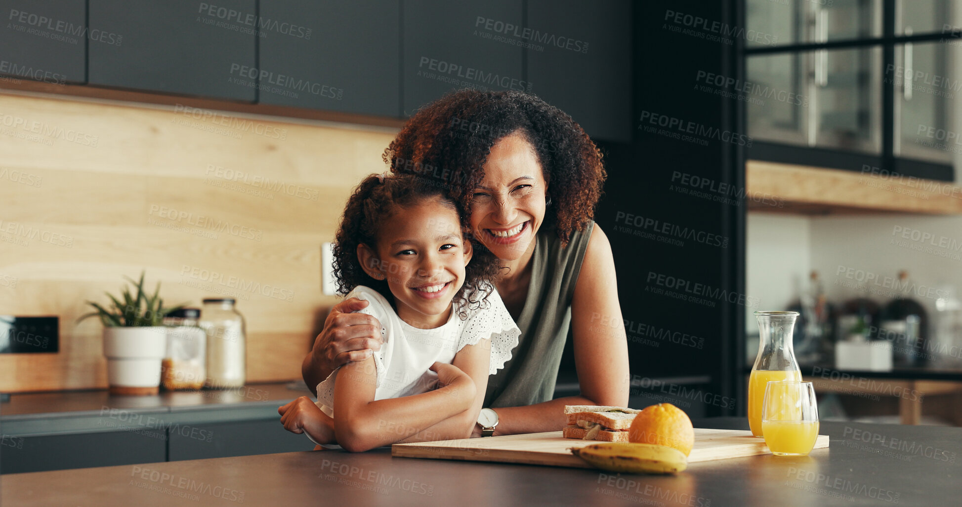 Buy stock photo Sandwich, hug and portrait of mom with child for love or bonding together for comfort, trust or support. Kitchen, proud mother or girl with smile in happy family home for affection, fruits or embrace