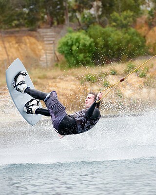 Buy stock photo Jump, wakeboarding and adventure, man on lake with outdoor fun, fitness and wave splash. Balance, water sports and person on river with freedom, speed and energy for surfing challenge, ski and trick