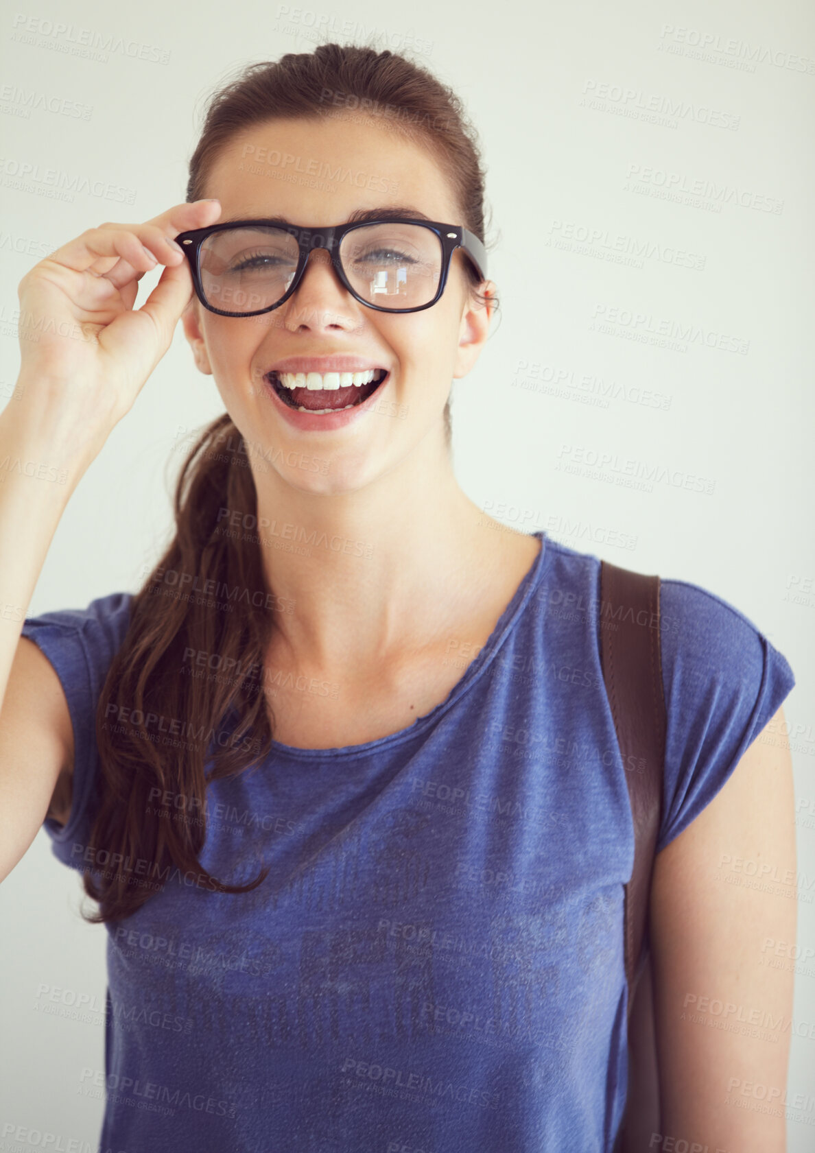 Buy stock photo Portrait, student or woman with glasses, funny or happiness on white studio background. Smile, girl or person with eyewear, university or casual outfit with clear vision, mockup space or prescription