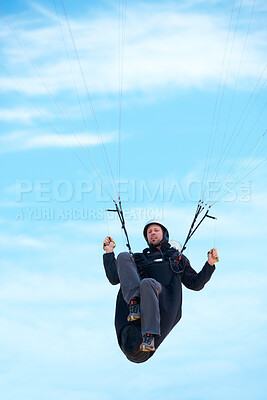 Buy stock photo Man, parachute and paragliding in air nature for exercise, healthy adventure with extreme sport. Athlete, glide or fearless for outdoor fitness for health wellness, helmet or safety gear by blue sky 