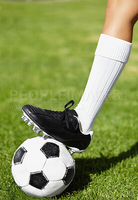 Buy stock photo Soccer, shoes and ball on field, sport and outdoor for competition, training and cleats in closeup. Football, person and steps with legs, foot and socks for exercise, grass and pitch for contest