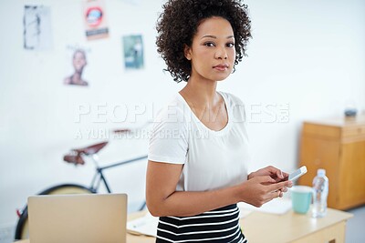 Buy stock photo Business woman, phone and portrait in office for social media, chat and communication at creative, magazine agency. Face of an African worker, designer or young person with confidence and mobile