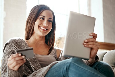 Buy stock photo Woman, online shopping and digital tablet with credit card on sofa for payment on ecommerce sale. Girl, debit card and booking online, credit score and easy purchase of convenience in a living room