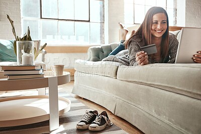 Buy stock photo Relax, mobile app and credit card, happy woman on couch with tablet and internet banking in home. Ecommerce technology, online shopping payment and girl on sofa surfing retail website or digital shop