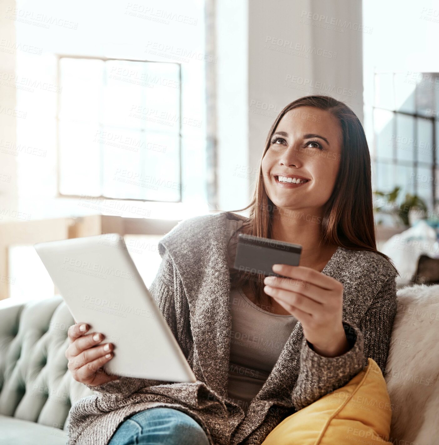 Buy stock photo Thinking, credit card and online shopping on digital tablet by woman on sofa for payment or booking online. Idea, girl and online banking with debit card for credit score, purchase and online order