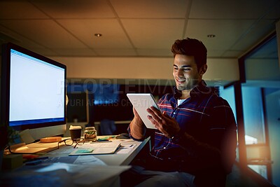 Buy stock photo Night, man and tablet in office for planning, web development and brainstorming creativity. Designer, computer screen and smile for productivity, research and SEO for marketing company at desk