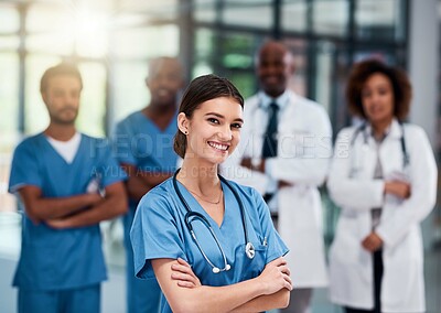 Buy stock photo Arms crossed, internship or leadership and portrait of nurse in hospital for collaboration or integrity. Medicine, proud and smile of happy medical student woman in clinic for service or trust