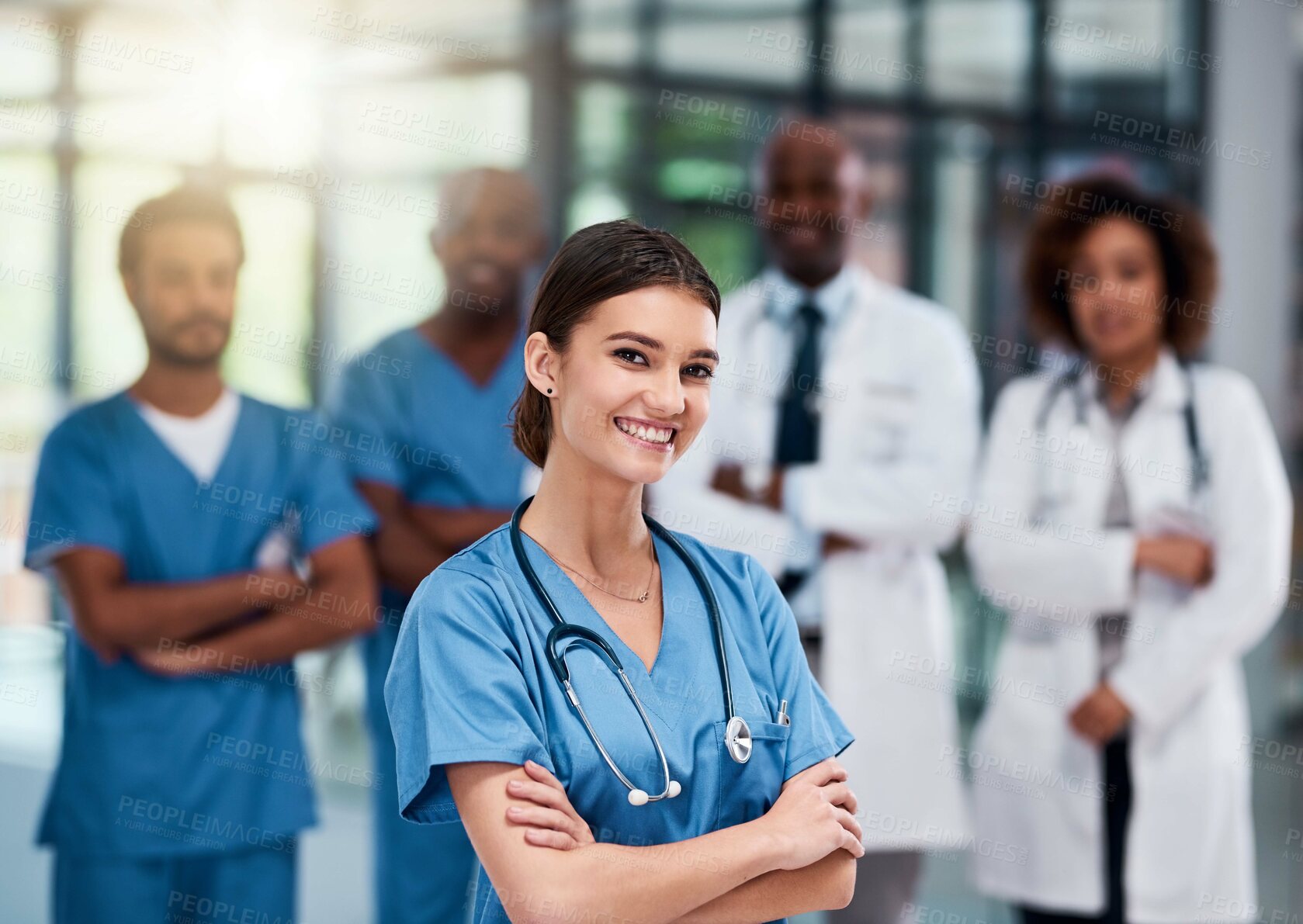 Buy stock photo Arms crossed, internship or leadership and portrait of nurse in hospital for collaboration or integrity. Medicine, proud and smile of happy medical student woman in clinic for service or trust