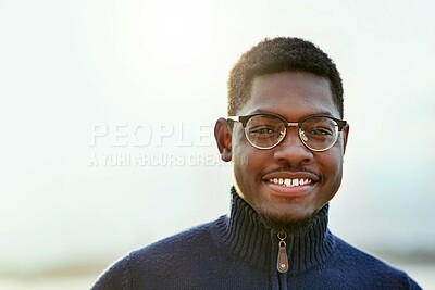 Buy stock photo Smile, gen z and fashion with portrait of black man in city for youth, culture and Identity. Happiness, edgy and cool with face of person in urban Kenya downtown for vacation, trends and style
