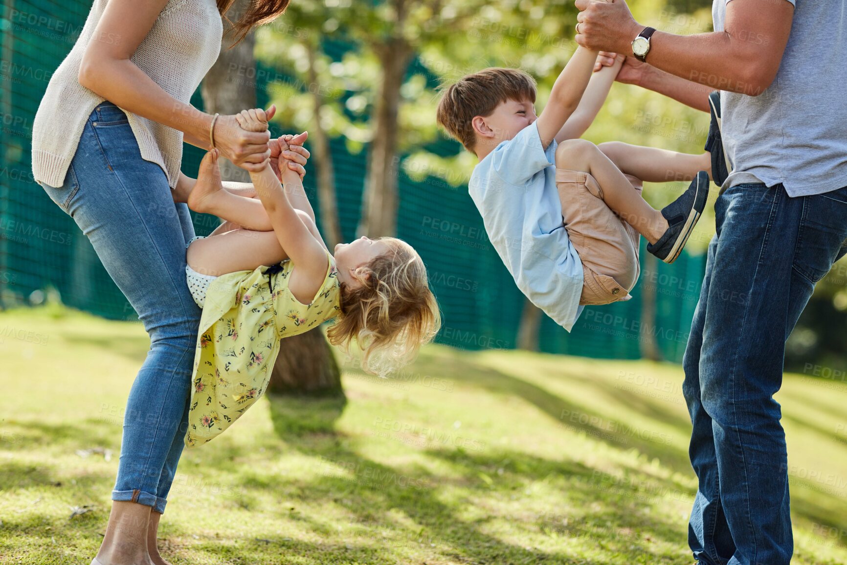 Buy stock photo Children, mom and dad playing in park for outdoor adventure with love, support and happy family. Father, mother and kids in garden together with bonding, playful fun and climbing games in backyard