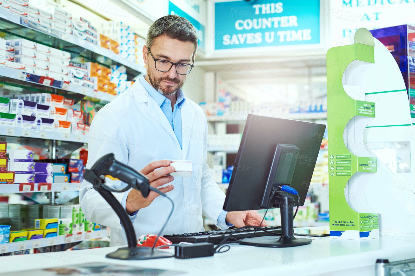 Buy stock photo Computer, medication and man pharmacist in dispensary with drugs for pills prescription. Inventory, medical and male medicine dispenser read health insurance information on technology in chemist.