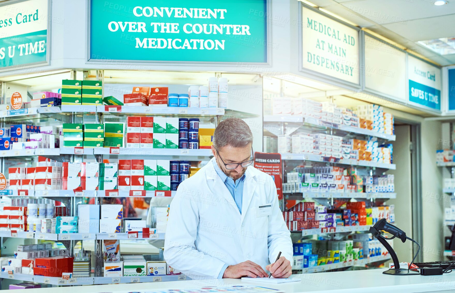 Buy stock photo Writing, medication and man pharmacist in dispensary with computer for pills prescription. Inventory, medical and male medicine dispenser read health insurance information on technology in chemist.