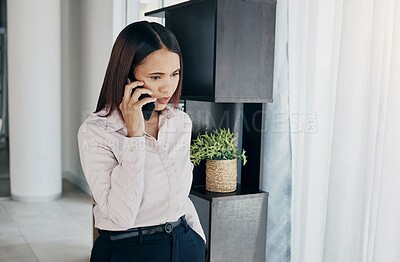 Buy stock photo Studio shot of a handsome young man listening to music while jumping in the air inside of a studio