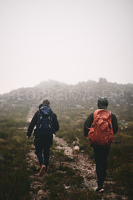 Buy stock photo People, hiking and outdoor mountain for exercise, extreme terrain and nature for winter adventure. Back, friends and trekking journey on remote vacation, explore mockup space and together with dog