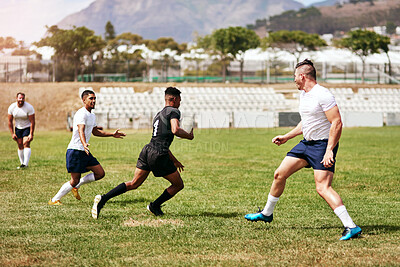 Buy stock photo Sports, outdoor and group of rugby players at match, training or competition with opponent. Team, fitness and men athletes playing game for practice, workout or exercise of skill on field at stadium