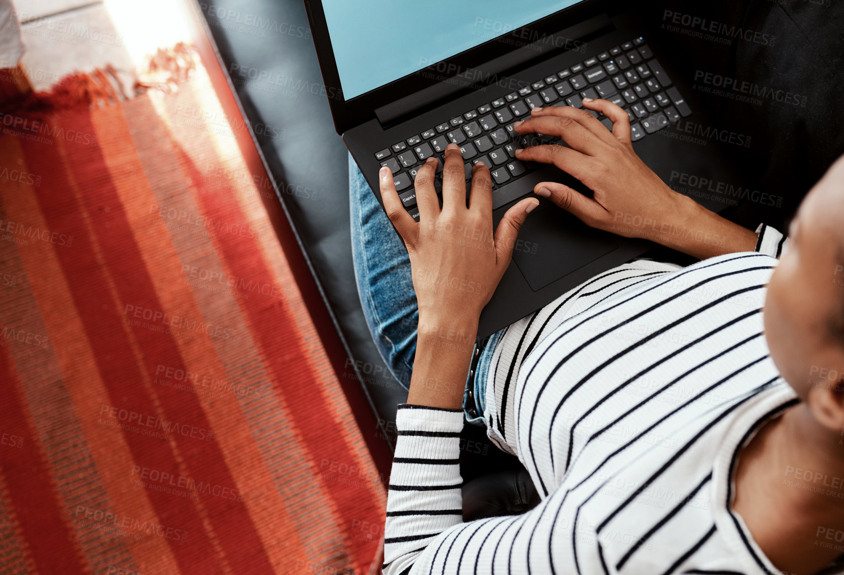 Buy stock photo Woman, home and typing on laptop on couch with blog post, remote work and freelance writing. Above, apartment and female person on website as journalist for research, news and article publication