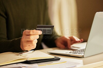 Buy stock photo Laptop, credit card and hands of man at desk for business, trade and ecommerce at home. Male person, notebook and check out on website for sale, wireless transaction or finance management at computer