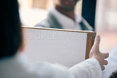 Buy stock photo Closeup shot of a woman receiving a parcel