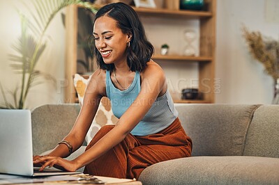 Buy stock photo Laptop writing, young woman and working from home with a smile for website. Happy freelancer, living room sofa and female person with remote work on lounge couch and typing a blog post on a computer