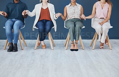 Buy stock photo Prayer, support and trust with people holding hands in a counseling session for mental health and wellness. Hope, worship and community in a group in therapy for help, solidarity and spiritual faith