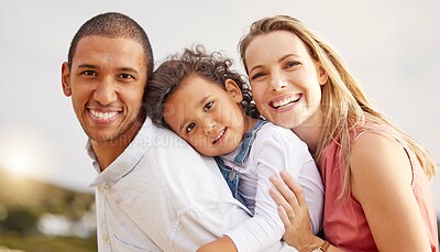 Buy stock photo Beach, travel and portrait of parents and kid by sea for bonding, relationship and relax in nature. Family, happy and mom, dad and child hug by ocean on holiday, vacation and adventure outdoors