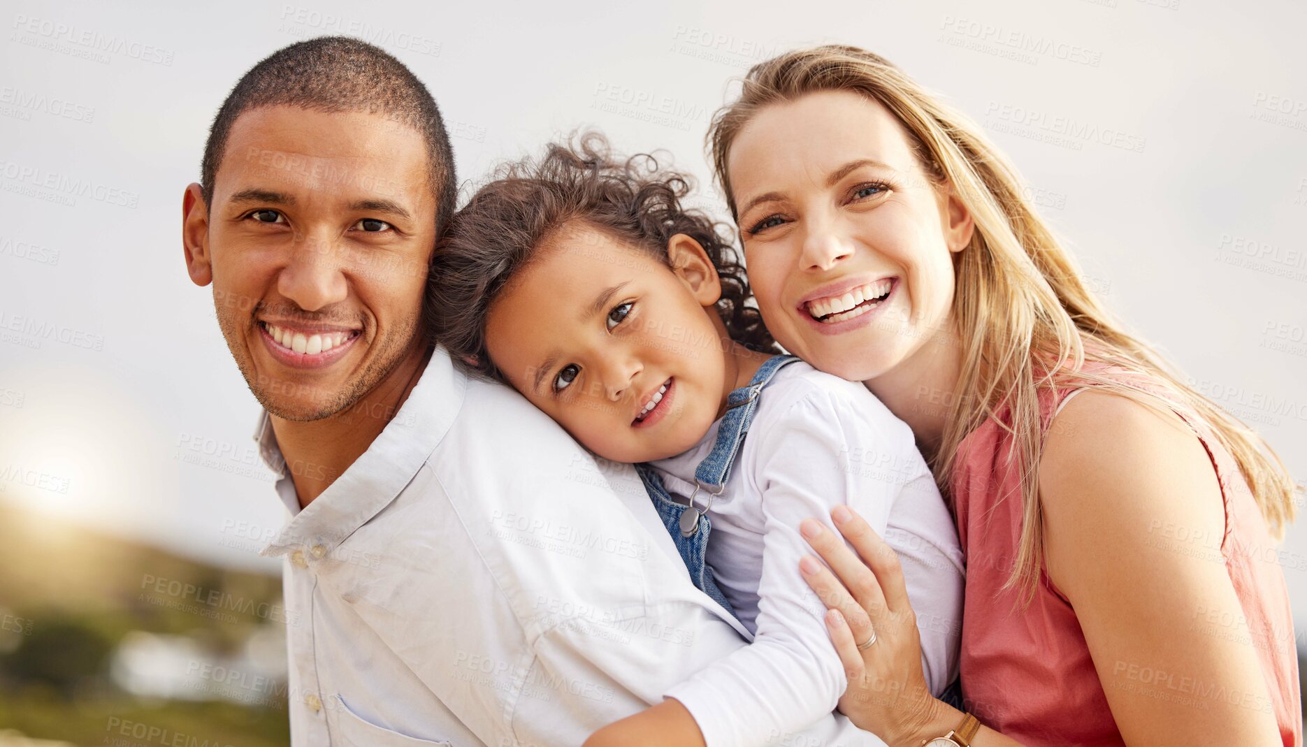 Buy stock photo Beach, travel and portrait of parents and kid by sea for bonding, relationship and relax in nature. Family, happy and mom, dad and child hug by ocean on holiday, vacation and adventure outdoors