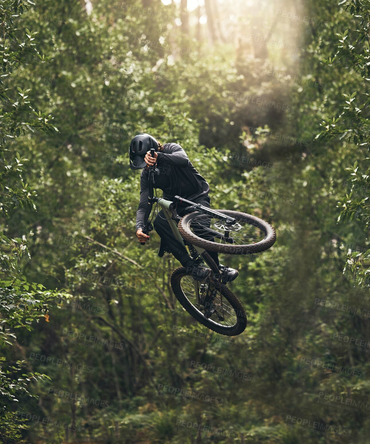 Buy stock photo Cycling, bicycle jump and sports man travel in Japan nature forest for adventure and extreme sport journey. Trees, stunt and mountain bike rider or cyclist training in woods for exercise and fitness