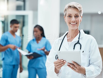 Buy stock photo Senior woman, doctor and tablet with smile for medical research, innovation and medicine at the hospital. Portrait of elderly female healthcare professional smiling with technology for Telehealth