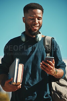 Buy stock photo Social media, student and black man with a phone at a college for communication, contact and mobile app. Studying, smile and African education learning on a mobile with 5g internet at university