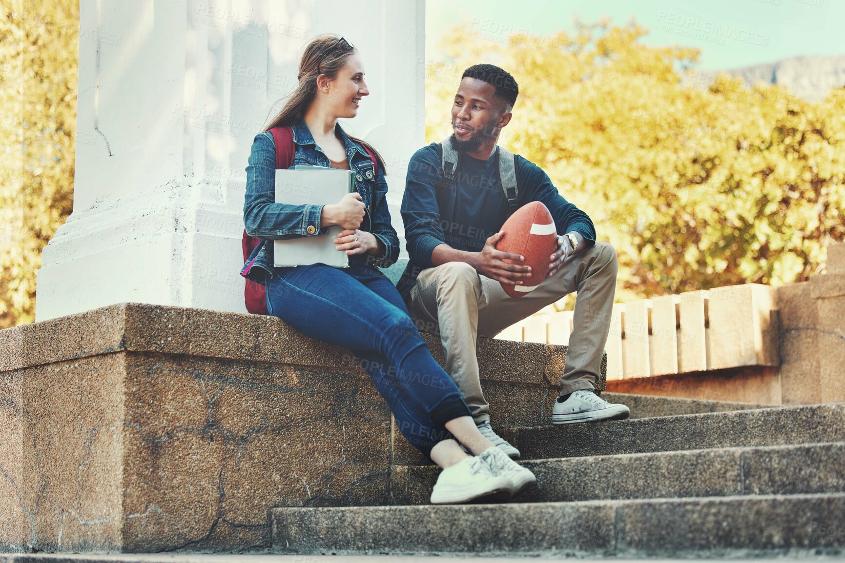 Buy stock photo University, students and friends in conversation for education, social interaction or talking at the campus. Man and woman in communication, socializing or discussion for learning scholarship outside