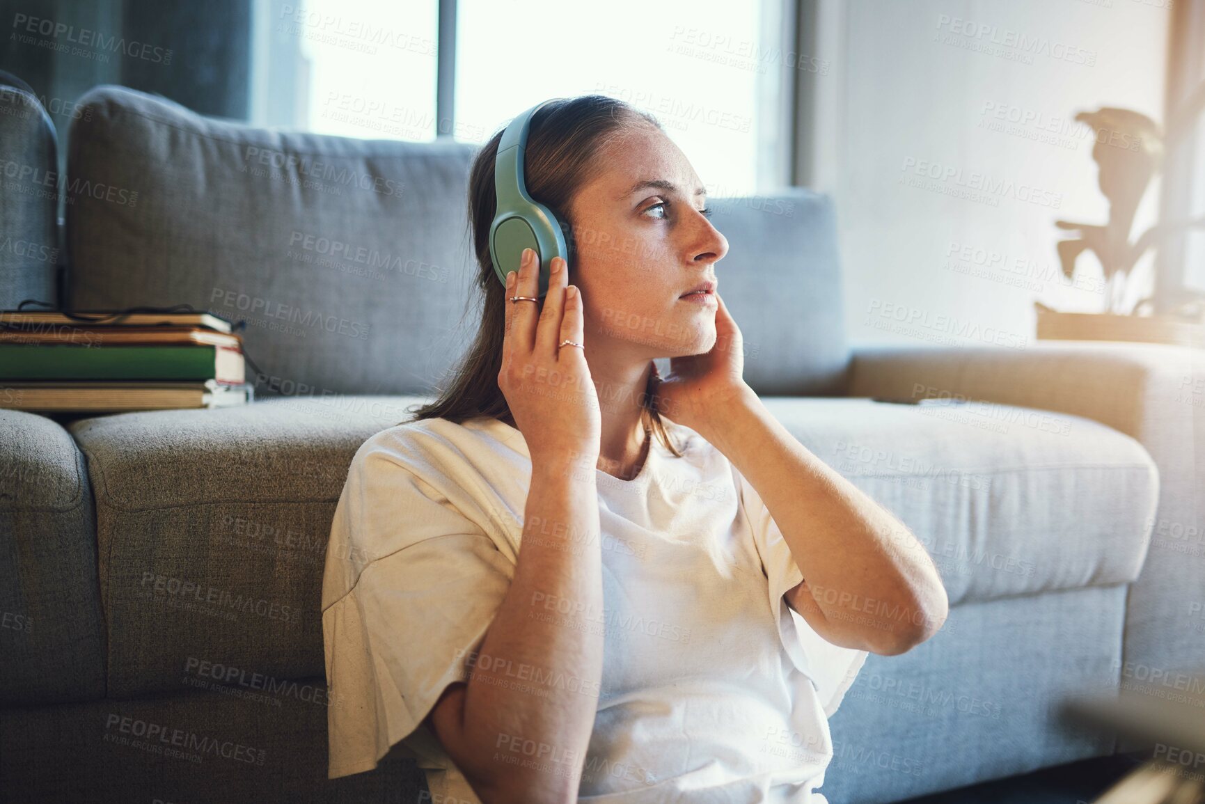 Buy stock photo Woman relax, music headphones and peace on living room sofa, sound and freedom, calm lifestyle or mindfulness. Young girl listening to meditation audio, web radio or streaming sound in apartment home