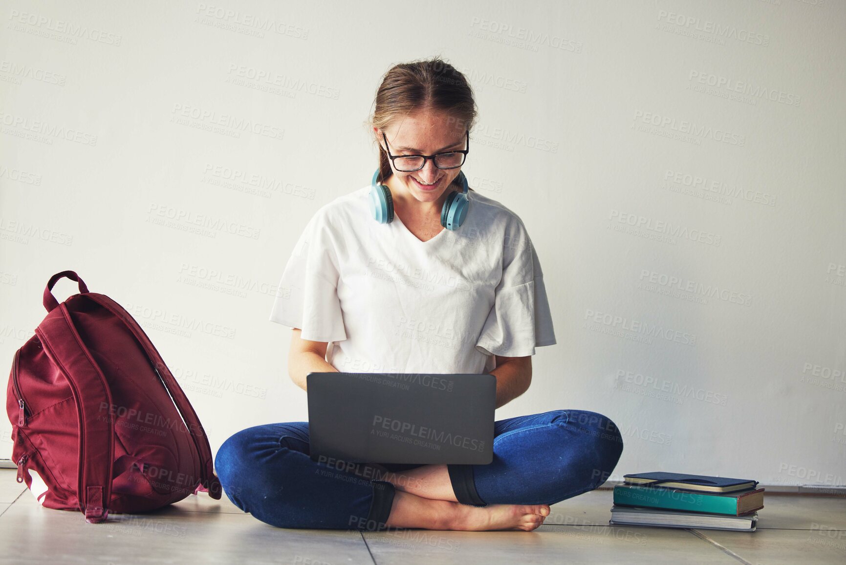 Buy stock photo Education, laptop and woman with books on a floor for research, examination and preparation, happy and motivation. Student, girl and online university assignment, book and literature study project