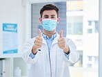 Covid, doctor thumbs up and face mask for medical corona virus healthcare, compliance safety and protection. Covid 19 health care, vaccine medicine and hospital or clinic professional with thank you 