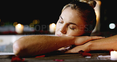 Buy stock photo Woman, relax or sleeping with pool at night for vacation, holiday or getaway at luxury resort. Female person, romance or asleep with relaxation in hot tub for stress relief or beauty spa treatment