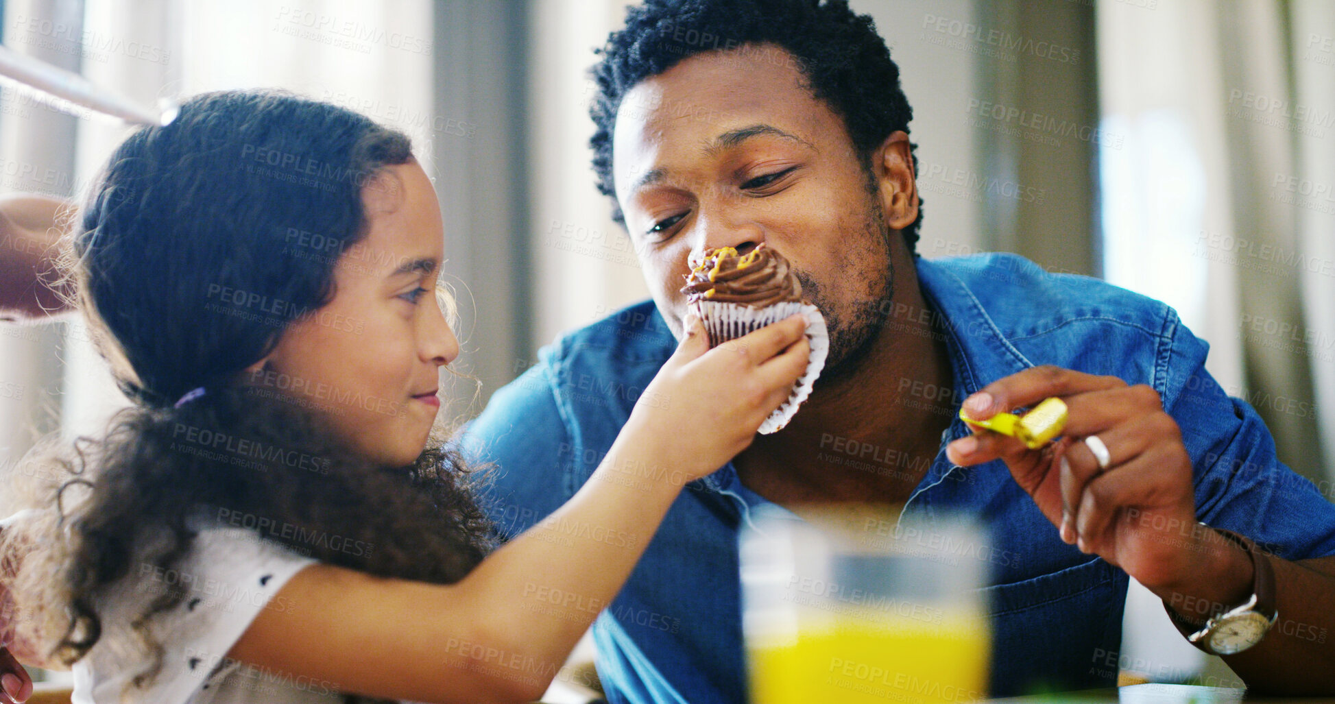 Buy stock photo Father, girl and smile with feeding cupcake at home for bonding, care and support. People, family and parent with kid for eating dessert or food as meal at apartment for fun and child development