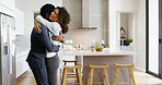 Couple, hug and excited for love in home, support and happiness for security in relationship. People, commitment and care for romantic partnership in kitchen, embrace and love together in marriage