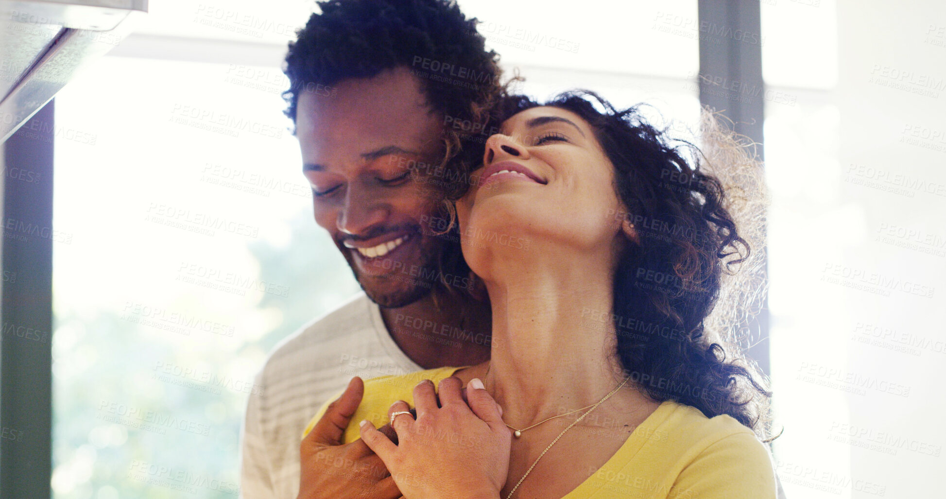 Buy stock photo Couple, hug and love for peace in home, support and happiness for security in relationship. People, comfortable and care for romantic partnership, embrace and together for commitment in marriage