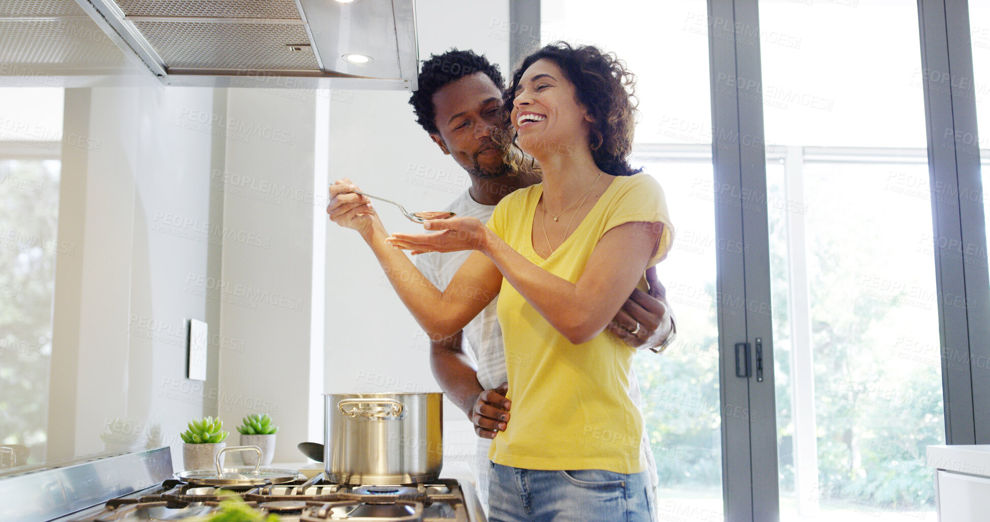 Buy stock photo Happy couple, kitchen and cooking for bonding together, dinner or meal prep with love or embrace. Woman, man and romance in home for affection, support or care in relationship as partner in apartment