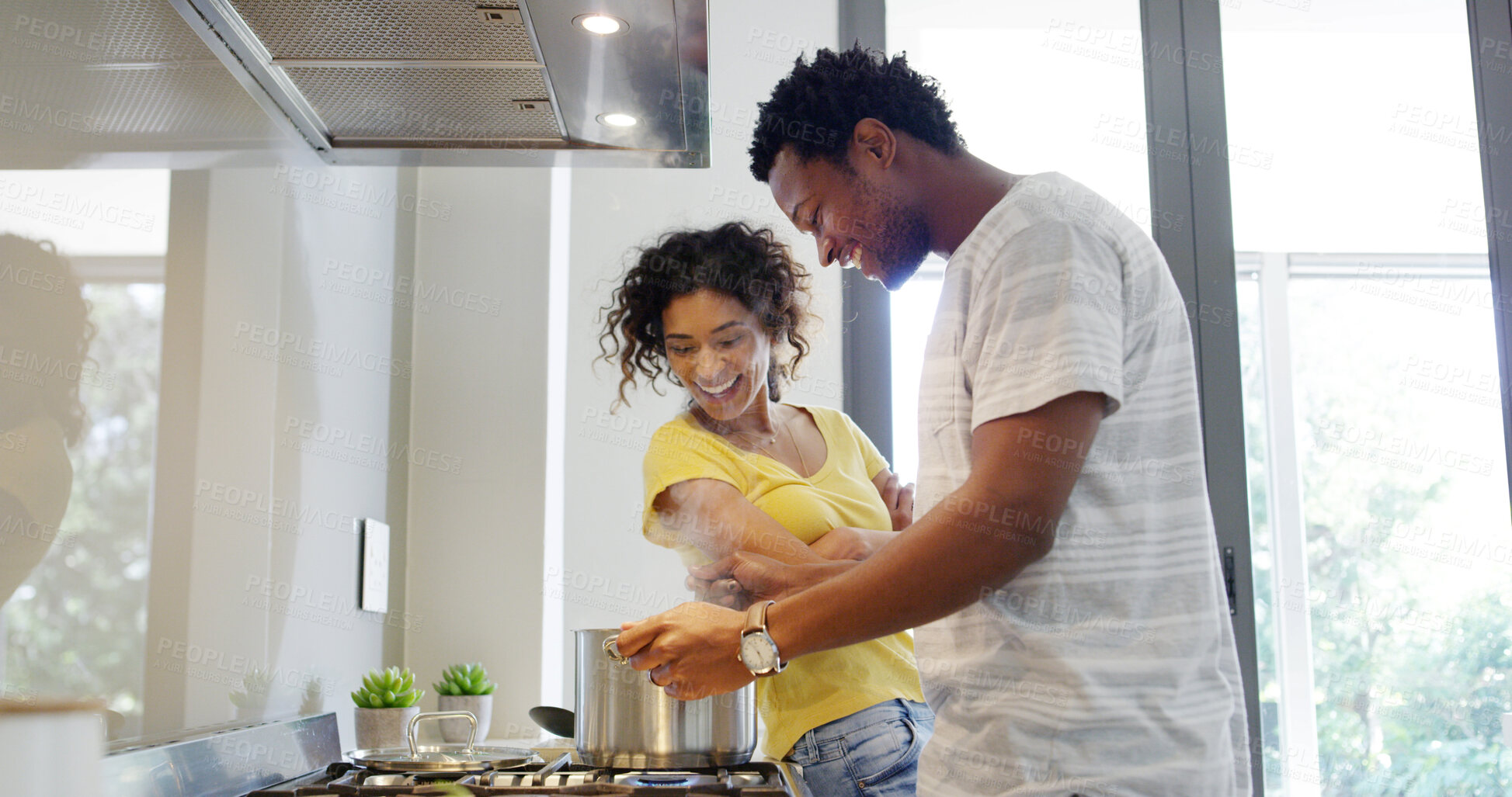 Buy stock photo Happy couple, home and cooking for dinner, meal prep or bonding together as excited for love. Woman, man and romance in kitchen with affection, support or care in relationship as partner in apartment