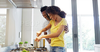 Buy stock photo Happy couple, kitchen and cooking for lunch, meal prep and bonding together for love in embrace. Woman, man and romance in home with affection, support or care in relationship as partner in apartment