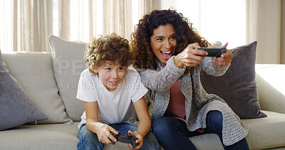 Buy stock photo Video, game and mom on couch with son, smile and competition for bonding together in home. Excited, mother and child on sofa with control for playing online with happy energy, electronics and fun